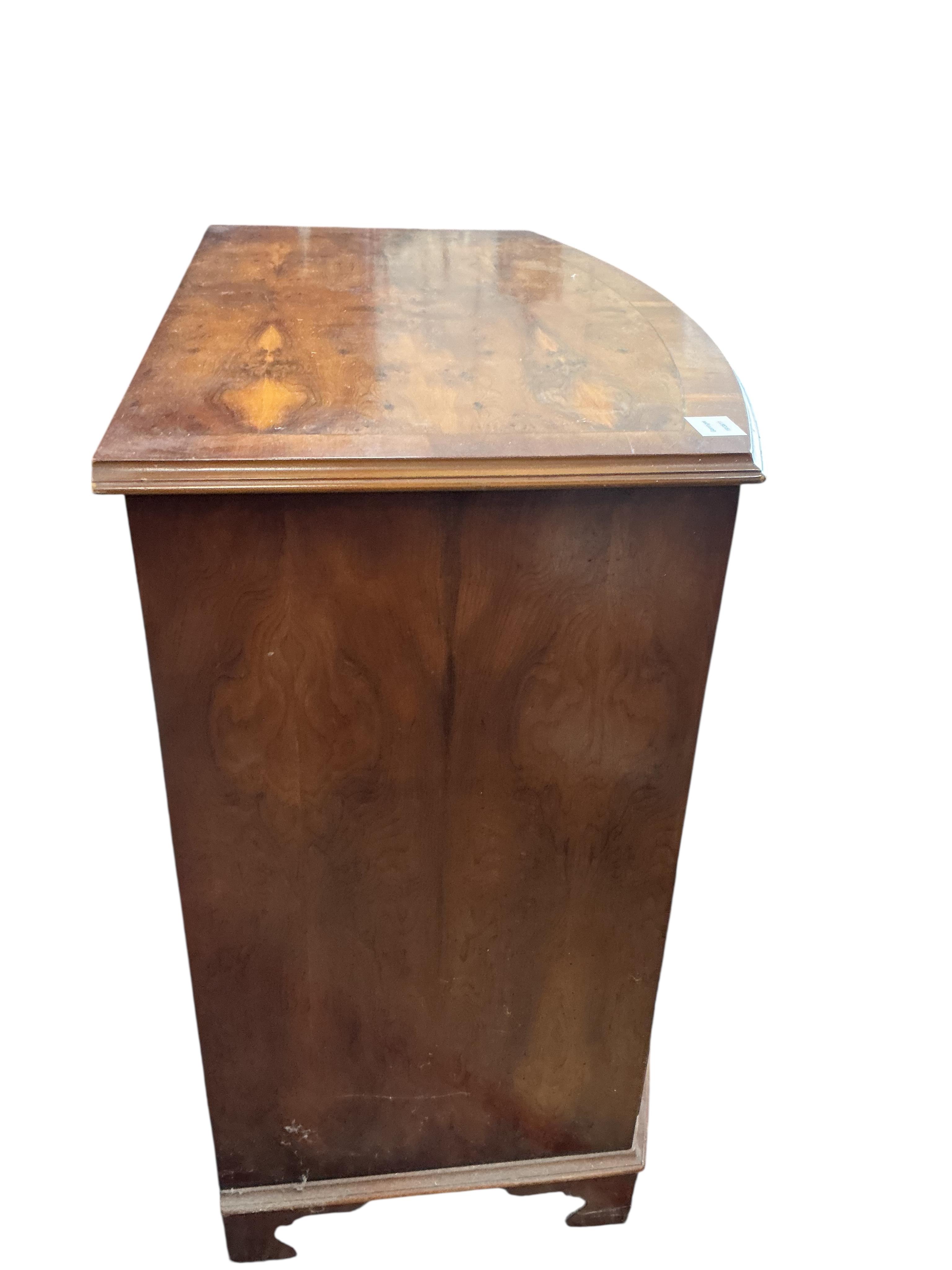 A small reproduction Regency style yew bowfront chest, width 86cm, depth 50cm, height 84cm